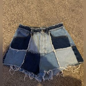 Patchy jean shorts